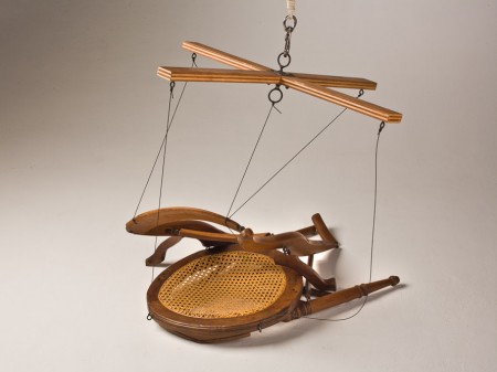 Original artwork by Barbara Downs, Slumped Chairionette, Repurposed Chair, disassembled and articulated